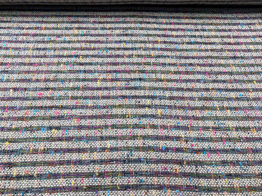 Tweed multicolore su beige chiaro