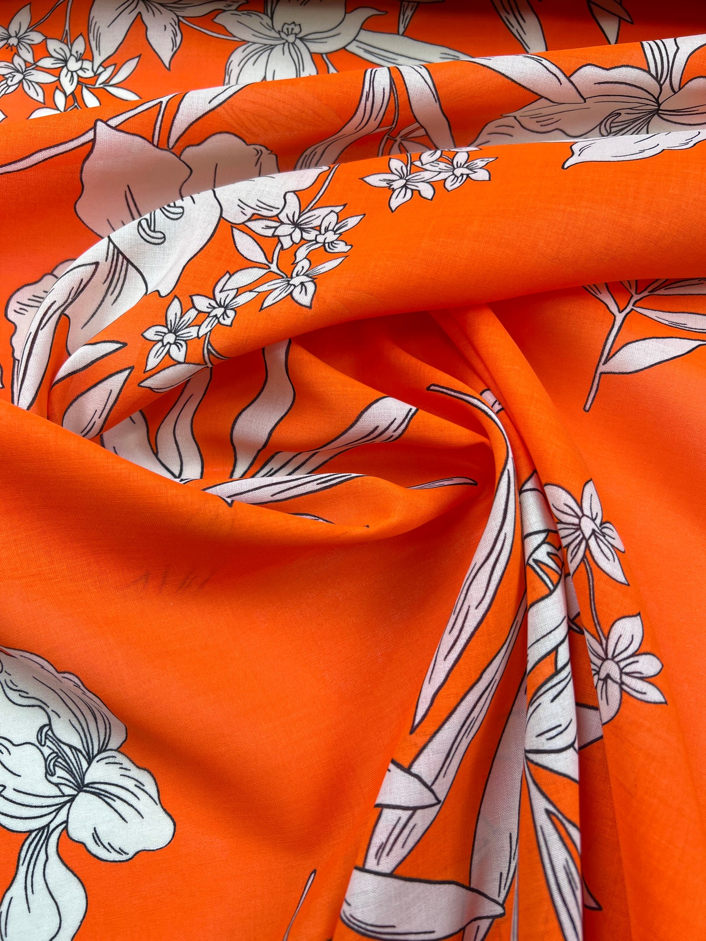 Viscosa stampata fiori su sfondo arancio