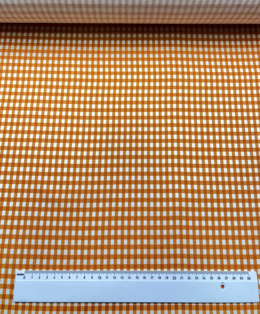 Cotone elasticizzato quadretti arancioni su sfondo bianco