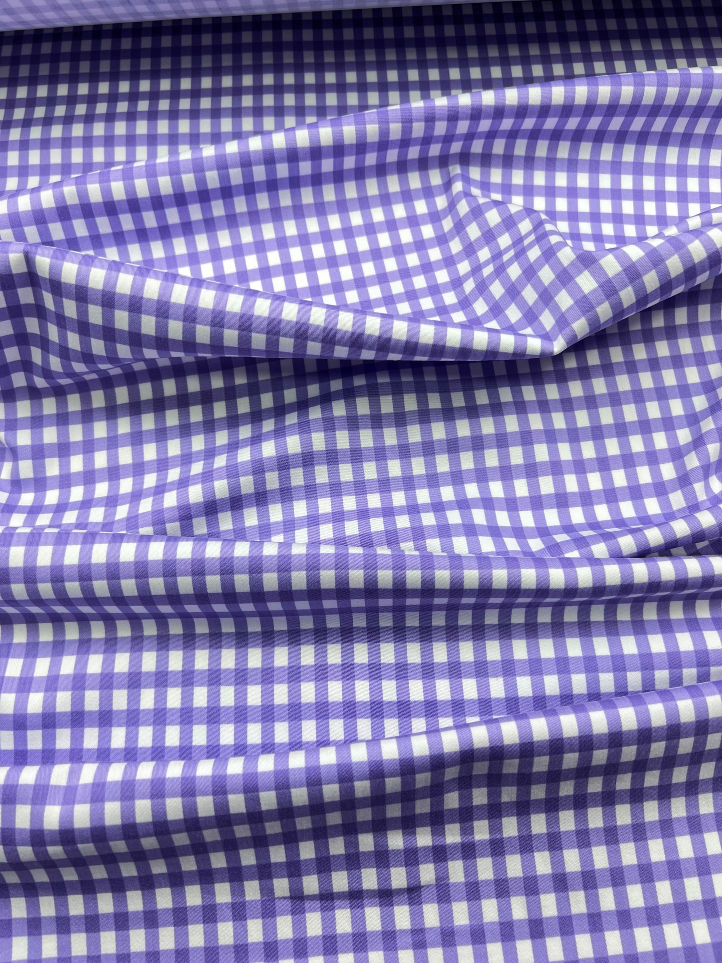Cotone elasticizzato quadretti viola su sfondo bianco