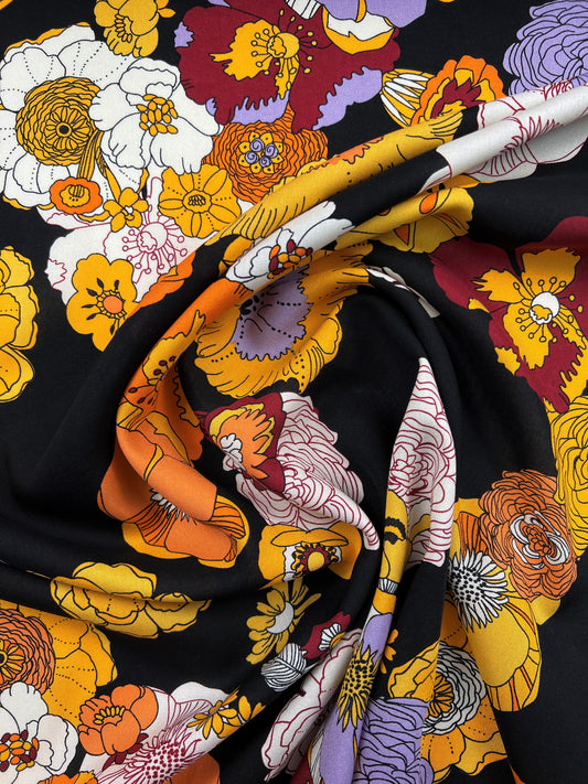 Viscosa stampata fiori arancioni su nero
