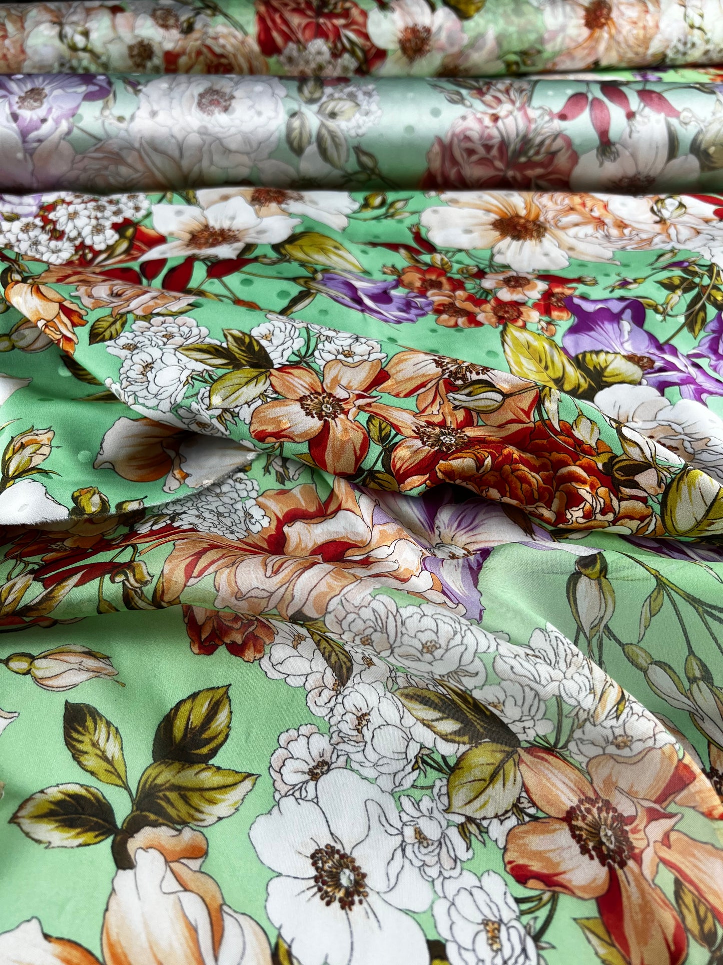 Jacquard di seta verde a pois