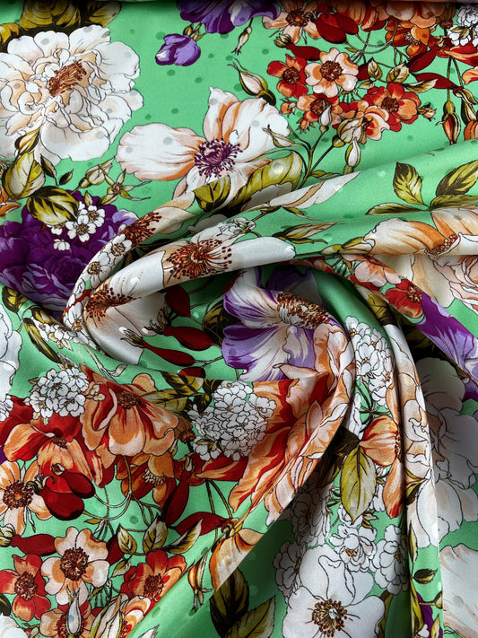 Jacquard di seta verde a pois