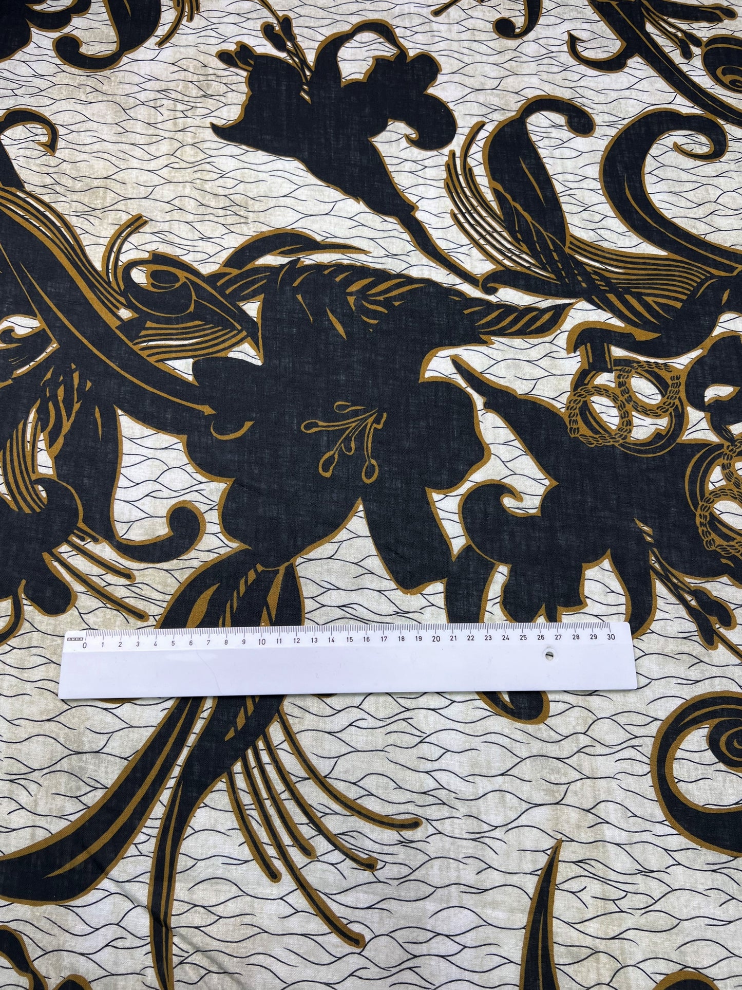 Lino stampato fiori neri su sfondo beige