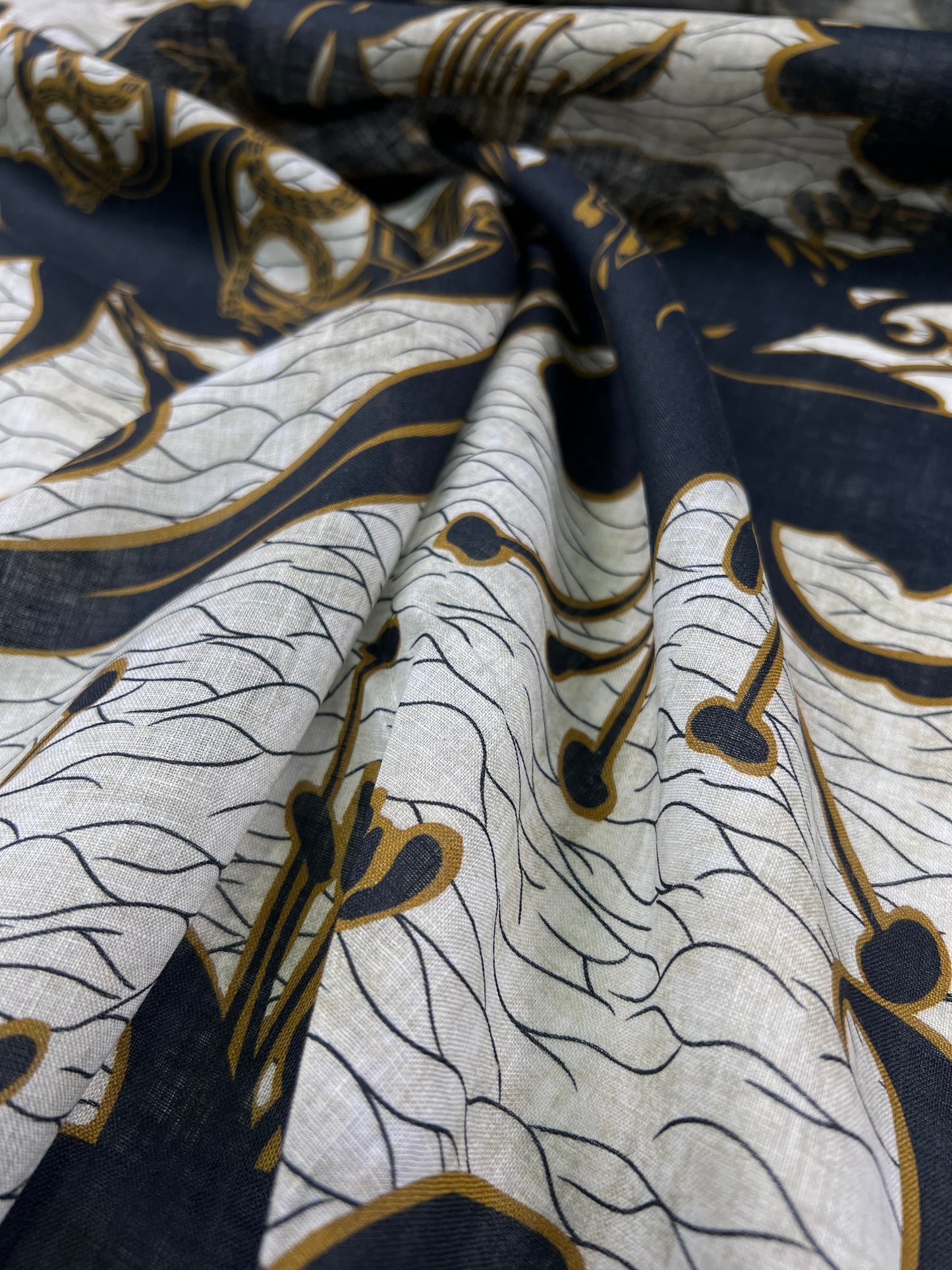 Lino stampato fiori neri su sfondo beige