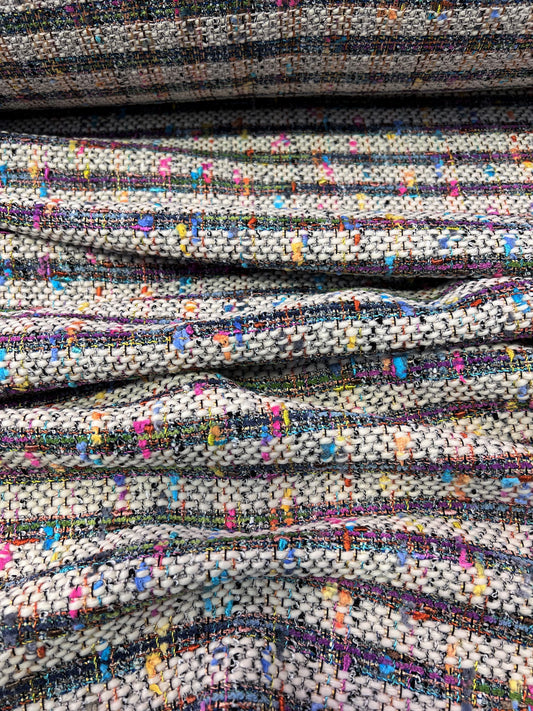 Tweed multicolore su beige chiaro